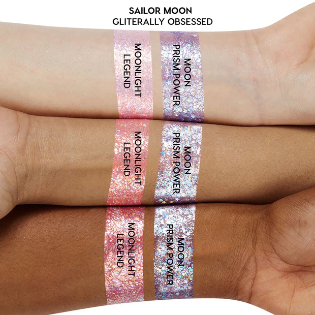 Swatches of two Sailor Moon glitter gels on three skin tones labeled Moonlight Legend and Moon Prism Power.