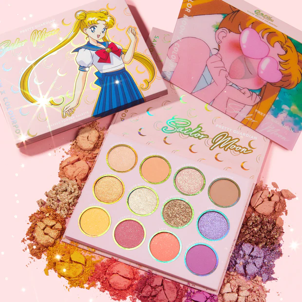 ColourPop x Sailor Moon eyeshadow palette with 12 colorful shades and Sailor Guardians artwork.